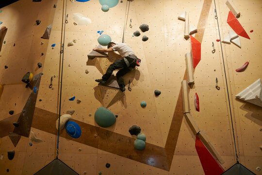 Man Rock Climbing