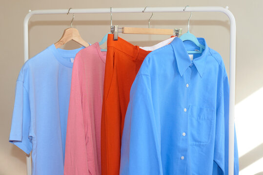 Colourful clothes on the rail