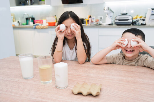 Kids Bake Cake and Play With Eggs in the Kitchen During Morning