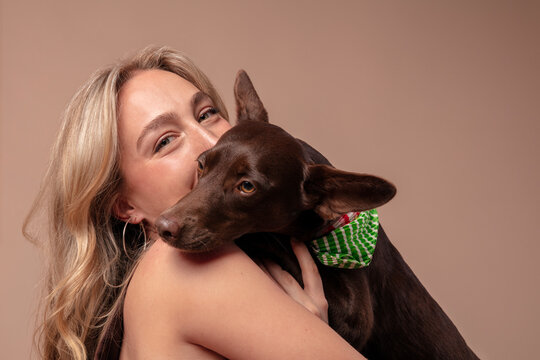 Woman Hugging Dog