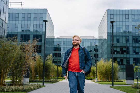 Man walking in office courtyard