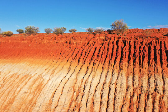 Dam wall cutaway. Red desert sand. Outback. South Australia.