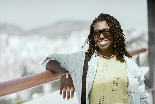 Smiling at the Railing