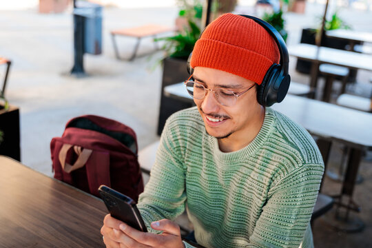 Student man listening to music