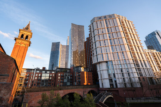 City Skyline With Old and New Buildings Under Blue Sky