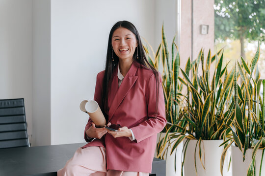 Portrait of young architect at work smiling at camera