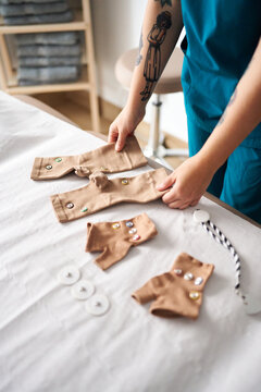 Physiotherapist preparing neurostimulation electrodes