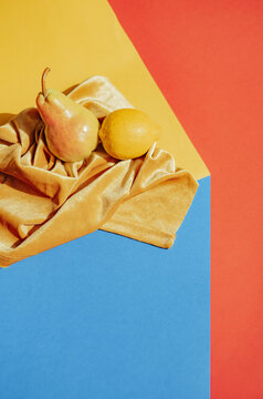 Colorful fruits on fabric during the day in a bright setting