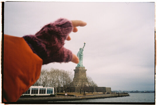 Hand Reaching Statue of Liberty