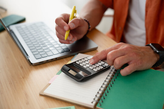 Person calculating finances