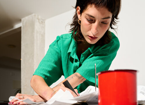 Working From Home at a Desk With Papers