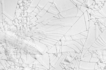Obraz premium Close-up of a shattered glass screen with a spiderweb crack pattern on Transparent background.