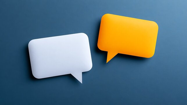 Awesome photo of two rectangular blank speech bubbles white and orange on dark blue background.