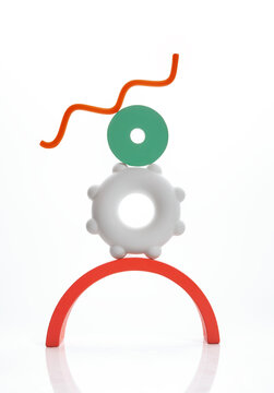 Playful geometric still life assembled from colorful household objects