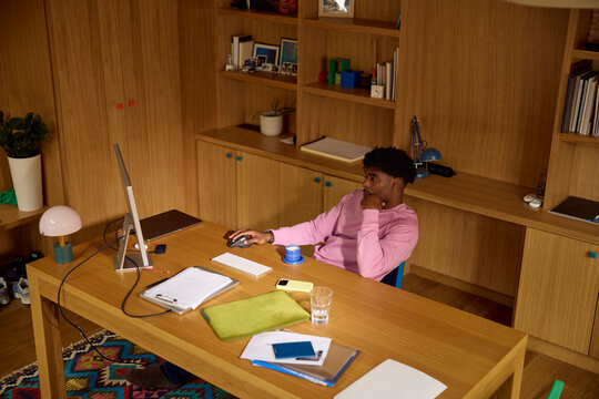 Man works comfortably from his home office