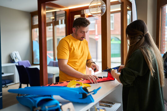 Dive center staff checking scuba diving equipment