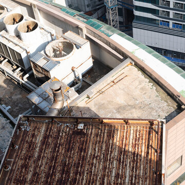 Industrial Rooftop Ventilation System in Soft Afternoon Sunlight