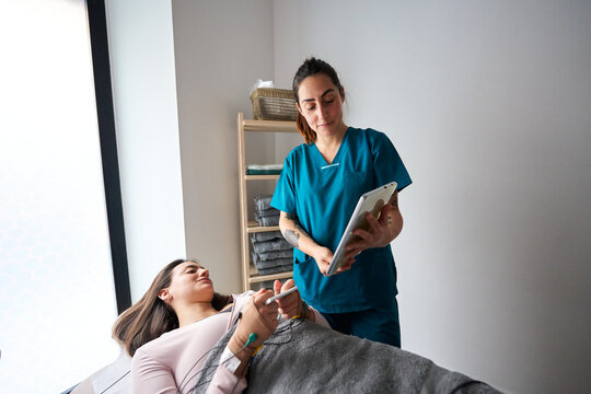 Patient receiving neurostimulation therapy with therapist