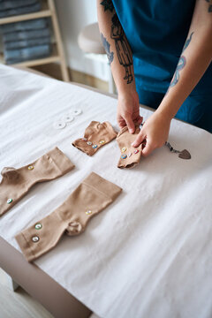 Physiotherapist preparing neurostimulation electrodes
