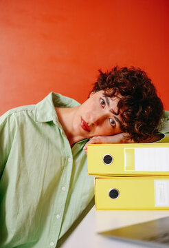 Woman in office with archive folders