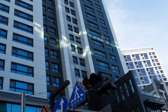 Deep Blue Apartment with Interesting Light Behind Traffic Signal