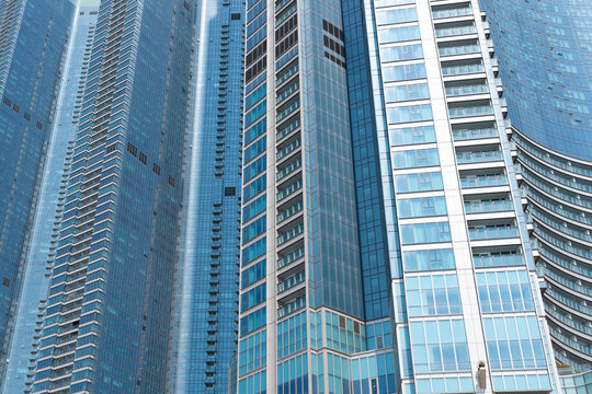 Modern Teal Glass Window Building Facade with Geometric lines