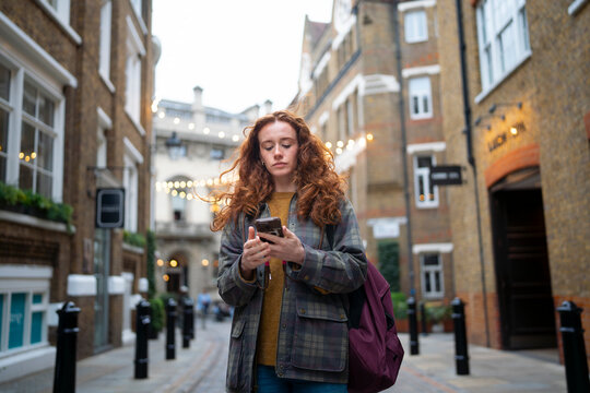 Using smartphone while walking in London