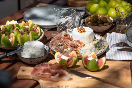 Mediterranean appetizer spread with cheese, figs and prosciutto