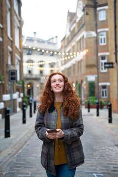 Looking up while exploring London street