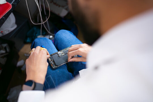 Fixing smartphone components close up