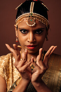 Indian classical dancer performing bharatanatyam mudra hand gesture