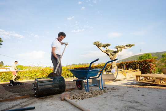 Team preparing soil for new lawn