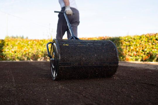 Front View Lawn Rolling Process