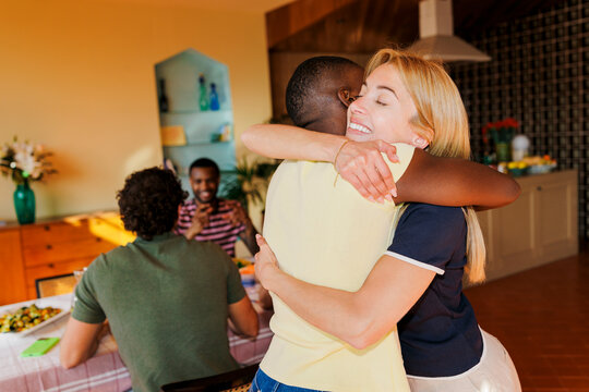 Women hugging celebrating connection at social gathering