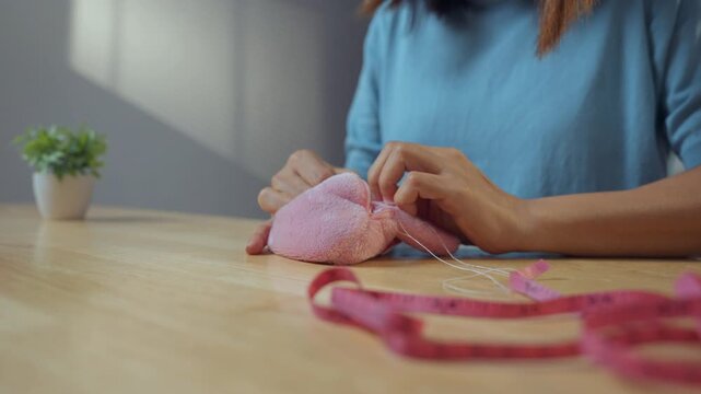 Woman sewing and crafting at home.