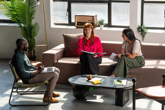 Casual Business Meeting With Diverse Smiling Colleagues 