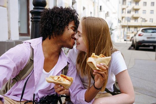 Tourists enjoying street food in city