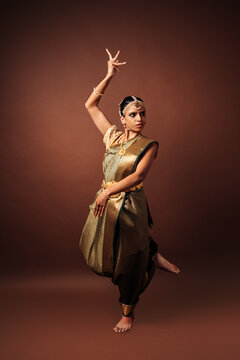 Indian woman performing bharatanatyam classical dance mudra gesture