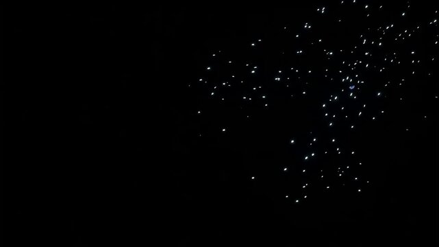 Blue fire ring motion footage featuring swirling magical energy particles glowing brightly in a dark isolated black background environment