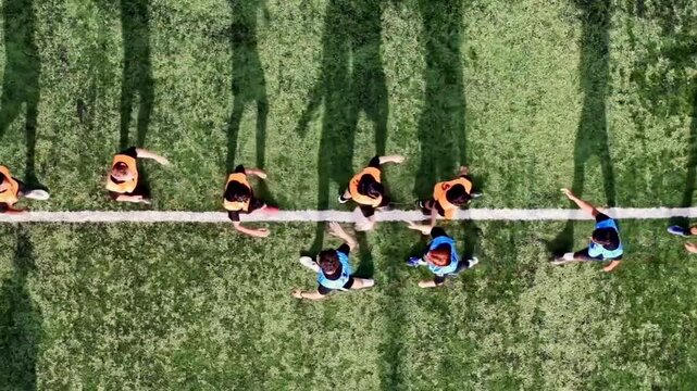 Before the match began, the referee had players from both teams shake hands to emphasize good manners, sportsmanship, and adherence to the rules of the game