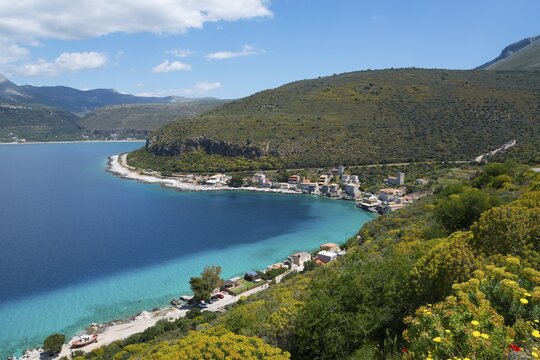 Stunning views of a coastline with beach and hills under a blue sky, Limeni, Areopoli, Laconia, Peloponnese, Greece