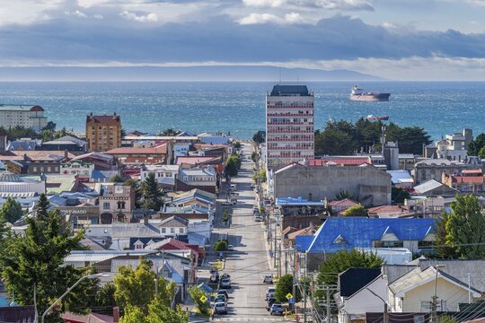 View from a hill over streets and houses to the Strait of Magellan, city of Punta Arenas, Patagonia, Chile