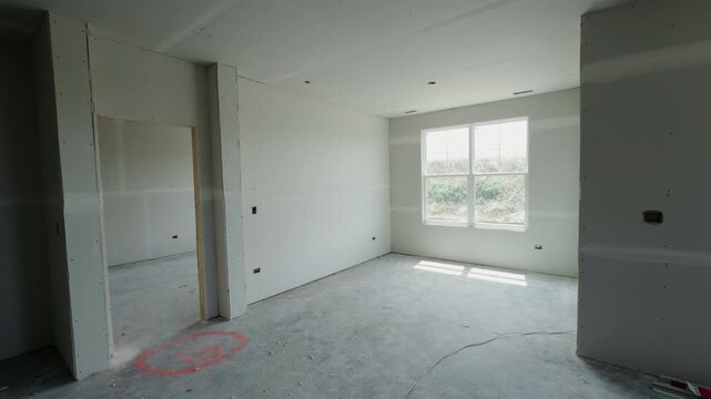 Unfinished interior room in a new residential house with drywall installation