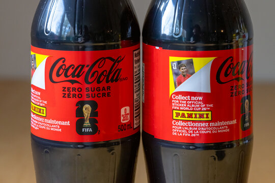 Calgary, Alberta, Canada. June 1, 2026. Two Coca-Cola Zero Sugar bottles featuring Panini FIFA World Cup 2026 sticker promo, close-up.
