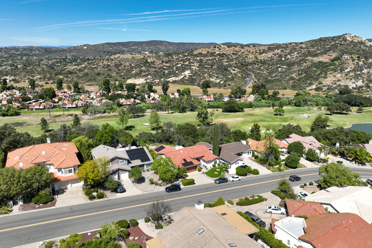 Aerial view of Ramona neighborhood with mountain, valley and San Vicente Golf Course, in California, USA