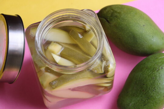 Authentic Green Mango in Salted Brine, Pickled Slices, Traditional Indian Uppilittathu or Kadumango