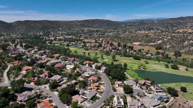 Aerial view of Ramona neighborhood with mountain, valley and San Vicente Golf Course, in California, USA