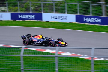 Obraz premium May 24, 2025, Montreal, Canada: Red Bull Racing Formula 1 car during by Hadjar or Verstappen, demonstration run at Circuit Gilles Villeneuve. g.