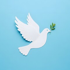 Fototapeta premium Clean white paper dove carrying green olive branch on a bright blue background International Peace Day