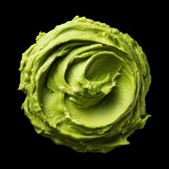 Fototapeta premium Creamy avocado paste Guacamole closeup isolated on black background with clipping path, concept freshness and natural food appeal